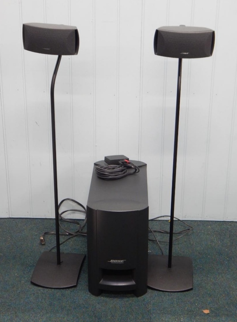 Appraisal: A Bose digital home theatre speaker system comprising two small