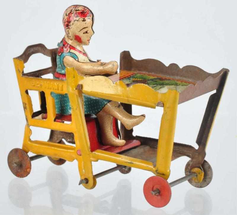 Appraisal: Tin Litho Baby in Highchair Penny Toy German Marked Germany