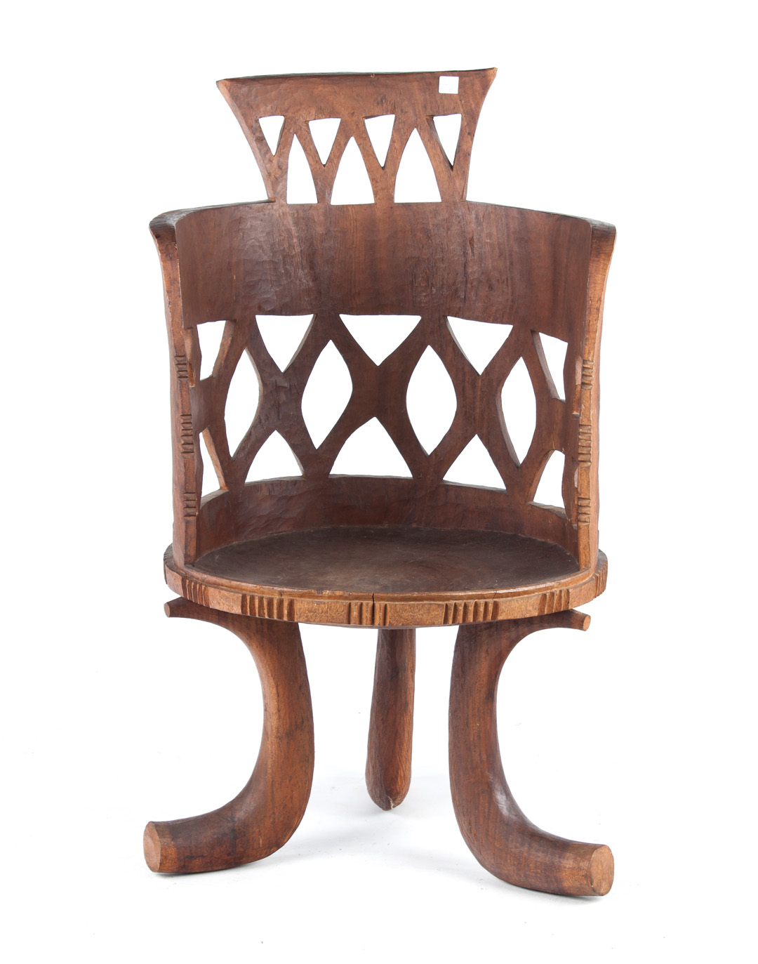 Appraisal: Large Konya chair from Ethiopia carved from a single large