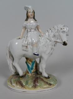 Appraisal: Staffordshire figurine Staffordshire figurine- Young Girl on Horseback crazing throughout