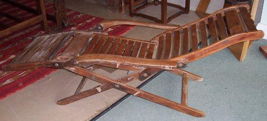 Appraisal: A Chinese reclining chair in huangli wood