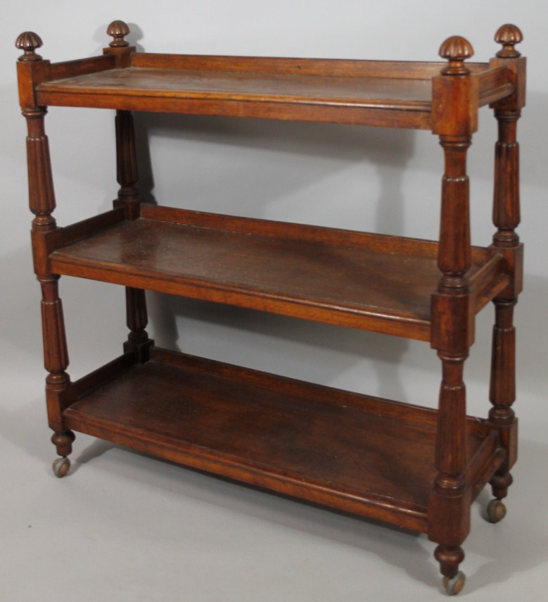 Appraisal: A thC oak buffet sideboard in three sections with fluted