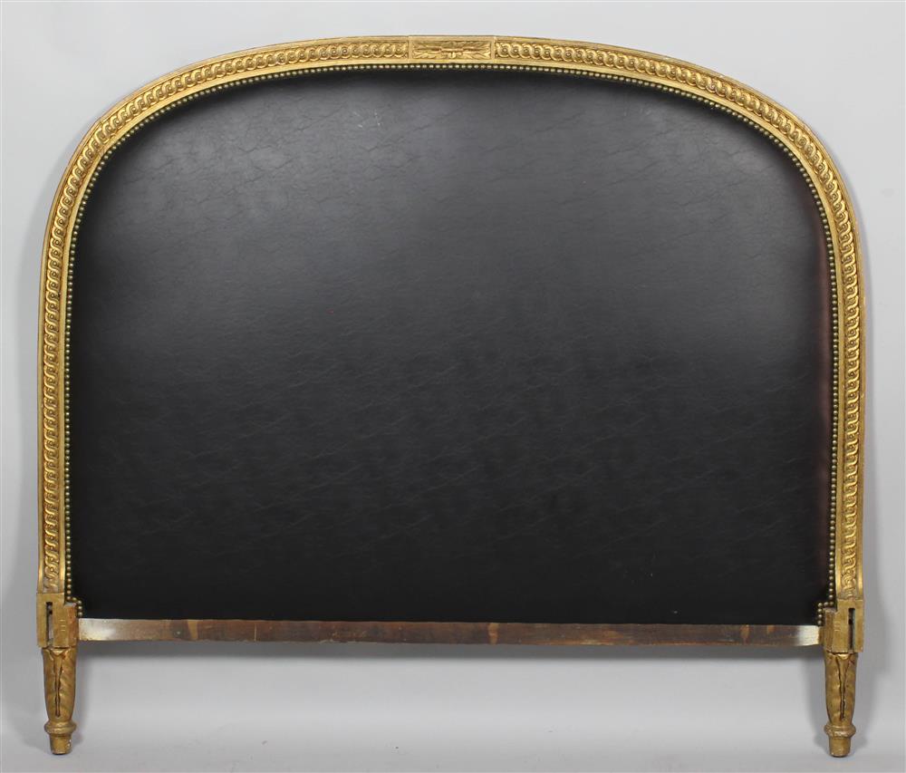 Appraisal: LOUIS XVI STYLE CARVED GILTWOOD AND BLACK LEATHER HEADBOARD the