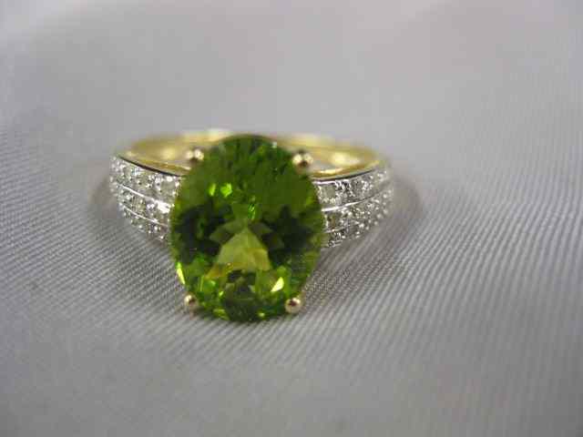 Appraisal: Peridot Diamond Ring rich carat oval gem with diamonds on