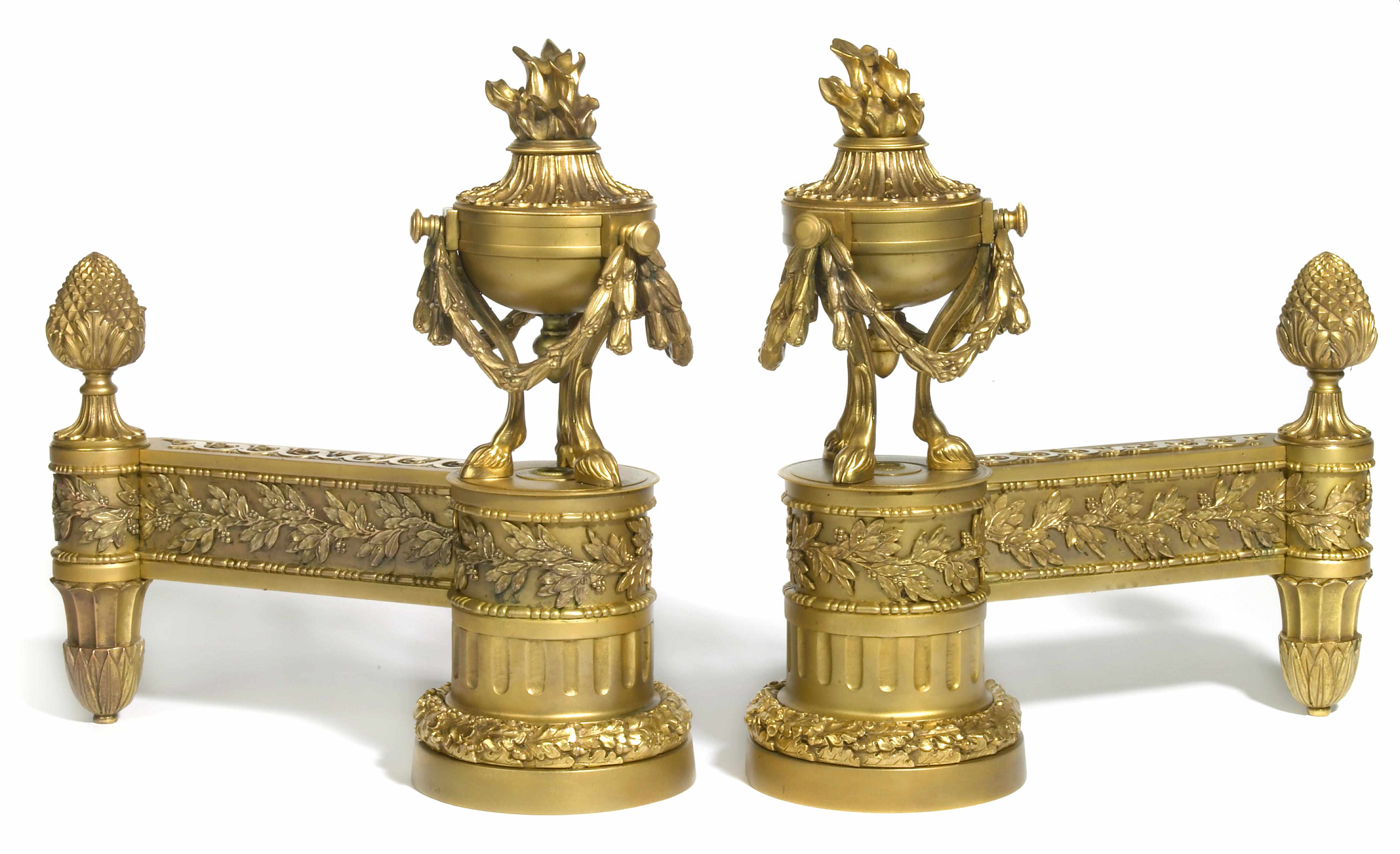 Appraisal: A pair of Louis XVI style gilt bronze chenets second