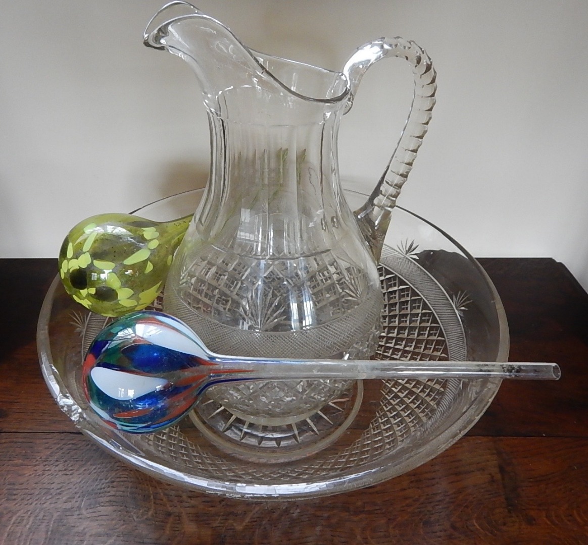 Appraisal: A cut glass jug and bowl set and two coloured