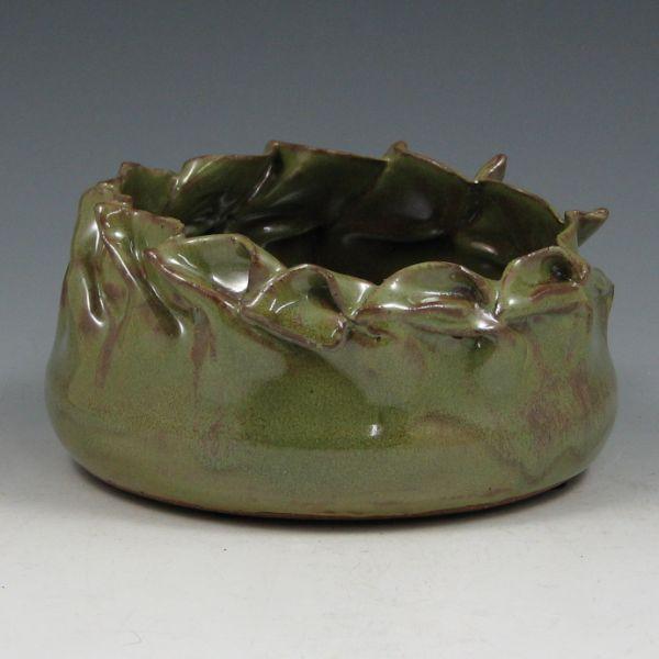 Appraisal: Clark House Pottery green progressive twirl basket Signed Clark with