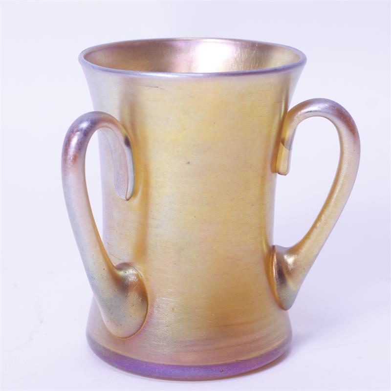 Appraisal: Tiffany Favrile Gold Iridescent Art Glass Three Handled Loving Cup