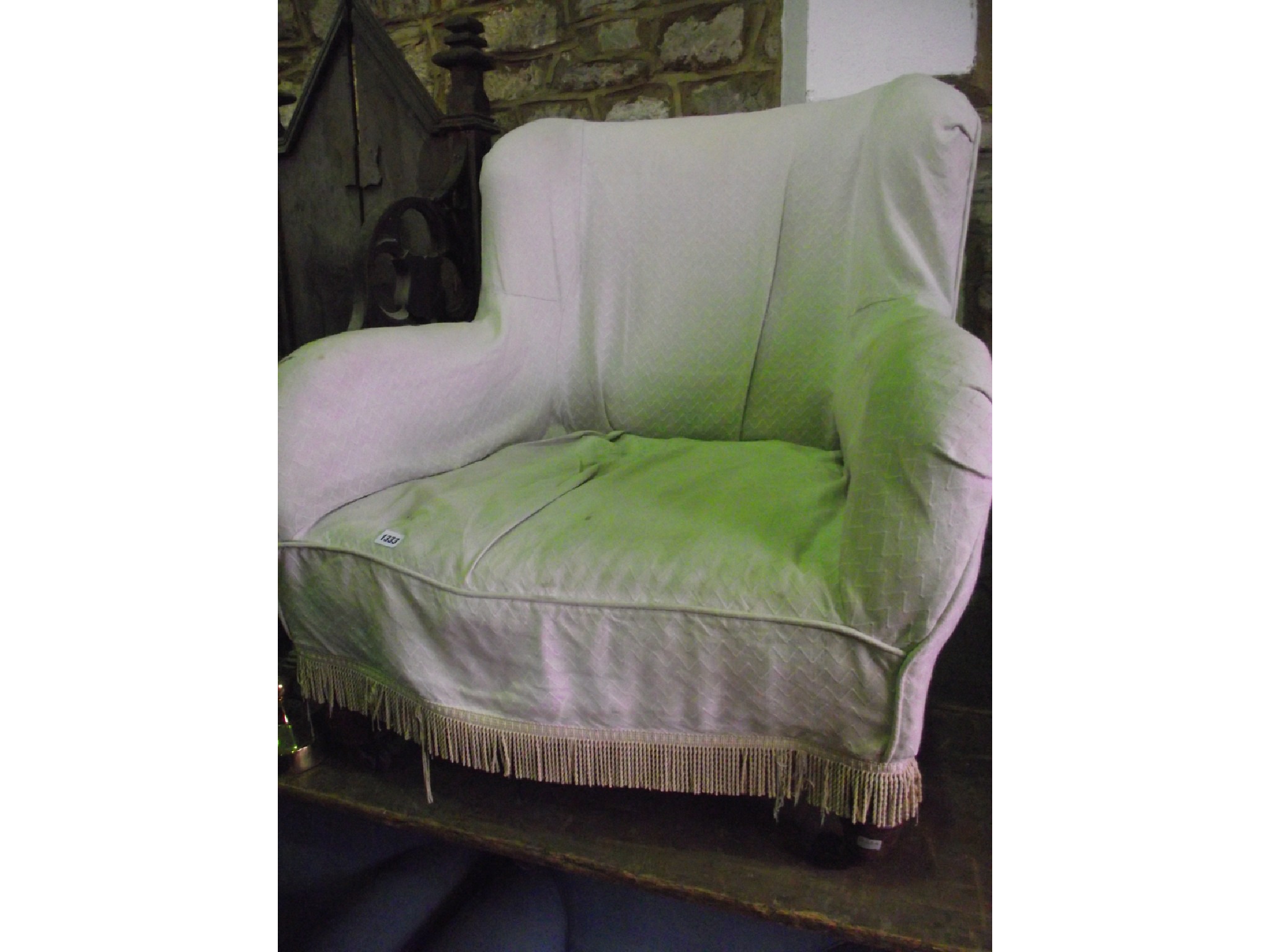 Appraisal: An Edwardian drawing room chair with shaped outline generous seat