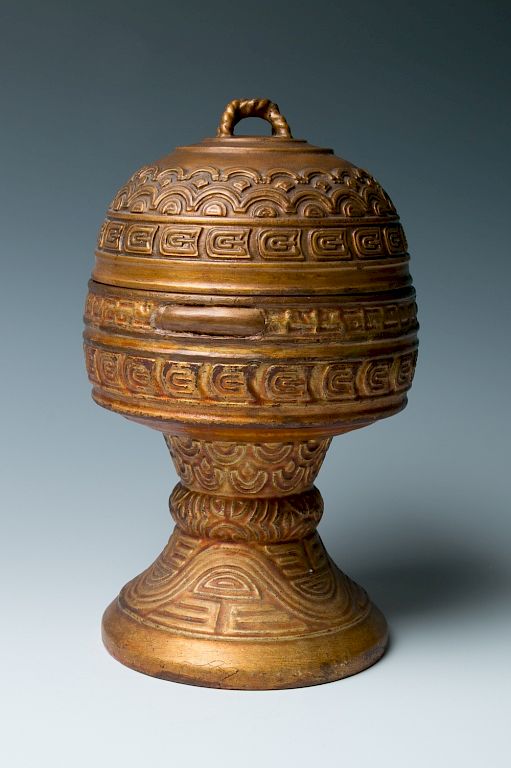 Appraisal: A GILT WOOD RITUAL CONTAINER AND COVE TH C A