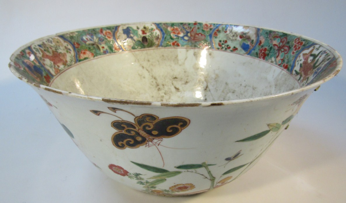 Appraisal: A Chinese porcelain punch bowl the shaped circular body heavily