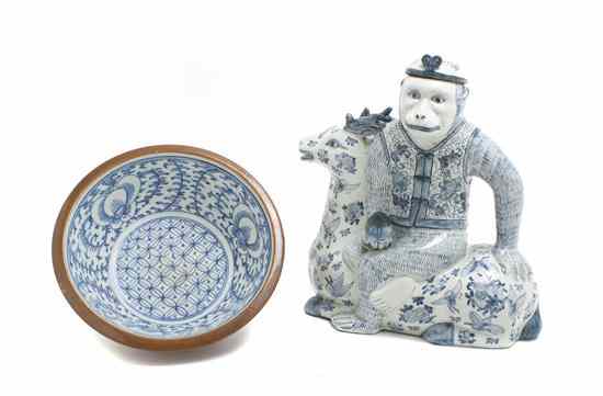 Appraisal: A Chinese Porcelain Covered Pitcher depicting a monkey riding a