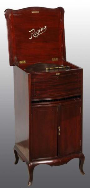 Appraisal: Regina Disc Double Comb Style Music Box Description Mahogany floor