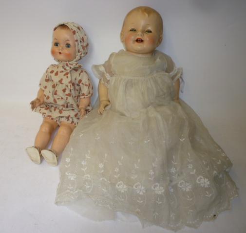 Appraisal: An American composition baby doll with green glass sleeping eyes