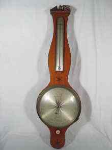 Appraisal: A Georgian mahogany banjo barometer with thermometer the case with