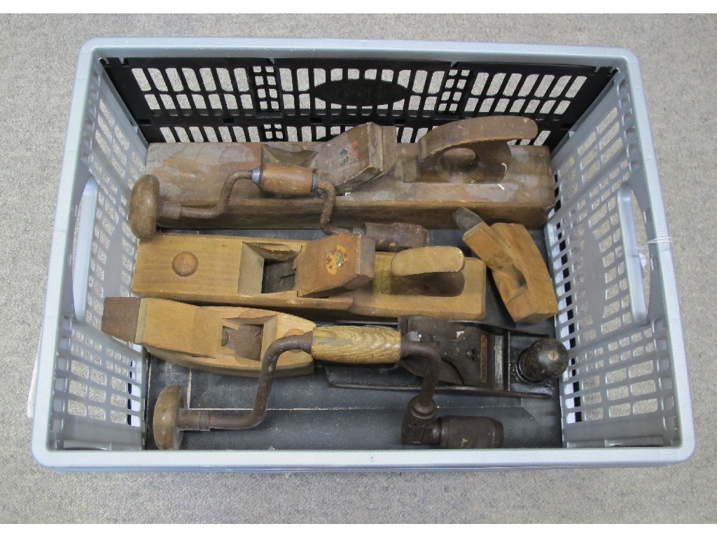 Appraisal: Box of assorted wood planes including a plane with curved