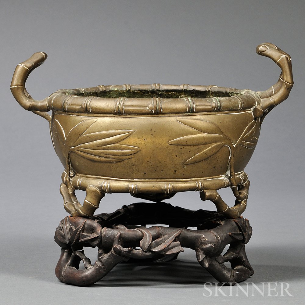 Appraisal: Bronze Censer China with bamboo-form handles tripod feet and rim