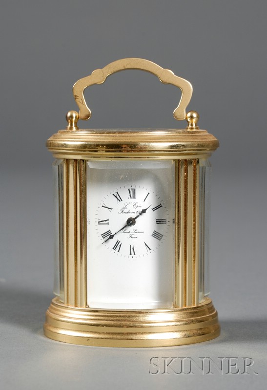 Appraisal: Miniature Oval Carriage Clock by L'Epie France th century the