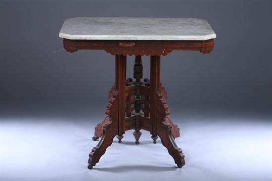 Appraisal: AMERICAN EASTLAKE-INFLUENCED WALNUT MARBLE-TOP BUTTERFLY-BASE SIDE TABLE Grey-veined white marble