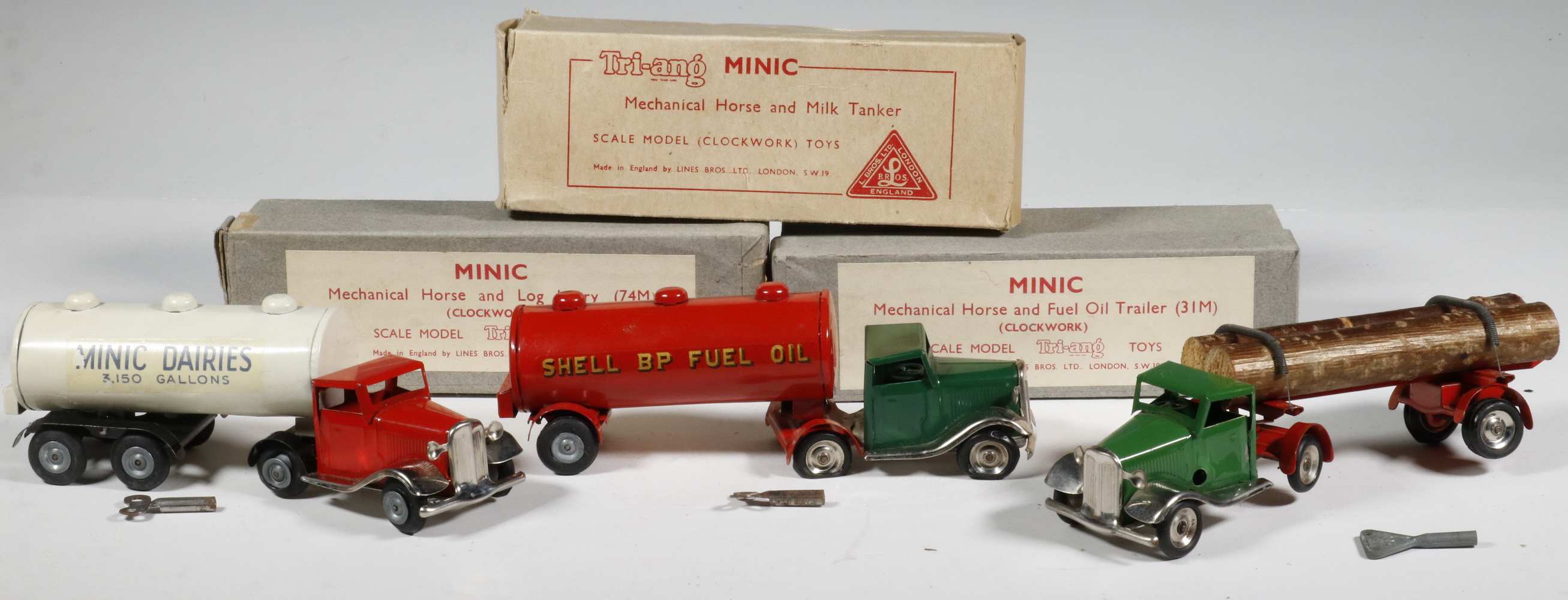 Appraisal: VINTAGE TRI-ANG MINIC TRUCKS Lot of British Made Tri-ang Minic