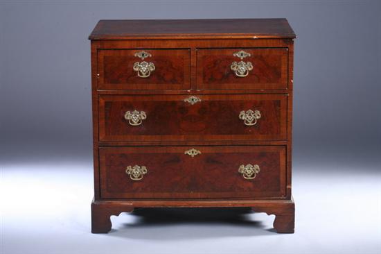 Appraisal: GEORGIAN-STYLE MAHOGANY FOUR-DRAWER CHEST th century with later hardware Molded-edge