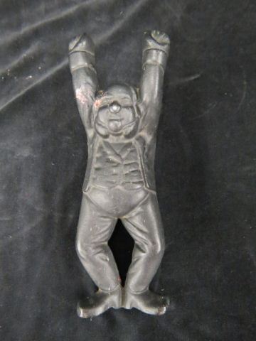 Appraisal: Cast Iron Figural Boot Jack man with raised arms