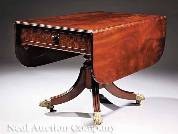 Appraisal: A Regency Mahogany Pembroke Table with drop leaves frieze drawer