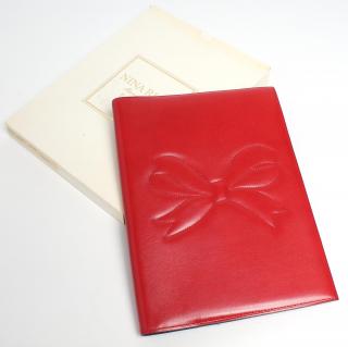 Appraisal: Nina Ricci Red Leather Soft Notebook Cover Decorative stitching to