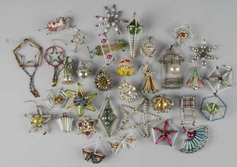 Appraisal: Lot of Beaded Christmas Ornaments Description Various forms include airplanes