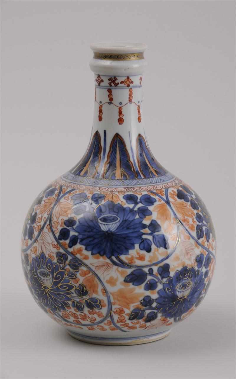 Appraisal: JAPANESE IMARI PORCELAIN BOTTLE-FORM VASE With lotus vines in cobalt