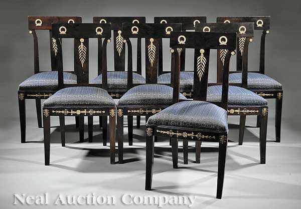 Appraisal: A Set of Eight Empire-Style Mahogany Dining Chairs decorated with