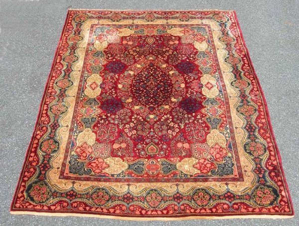 Appraisal: Room size Persian rug Central medallion on dark red ground