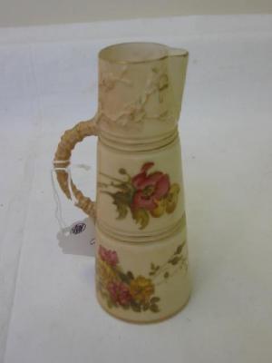 Appraisal: A ROYAL WORCESTER BLUSH PORCELAIN EWER of tapering form moulded