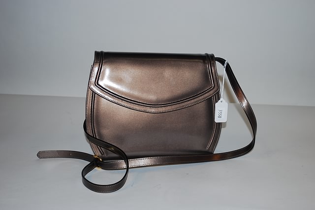 Appraisal: Salvatore Ferragamo iridescent bronze handbag with front closureand shoulder strap