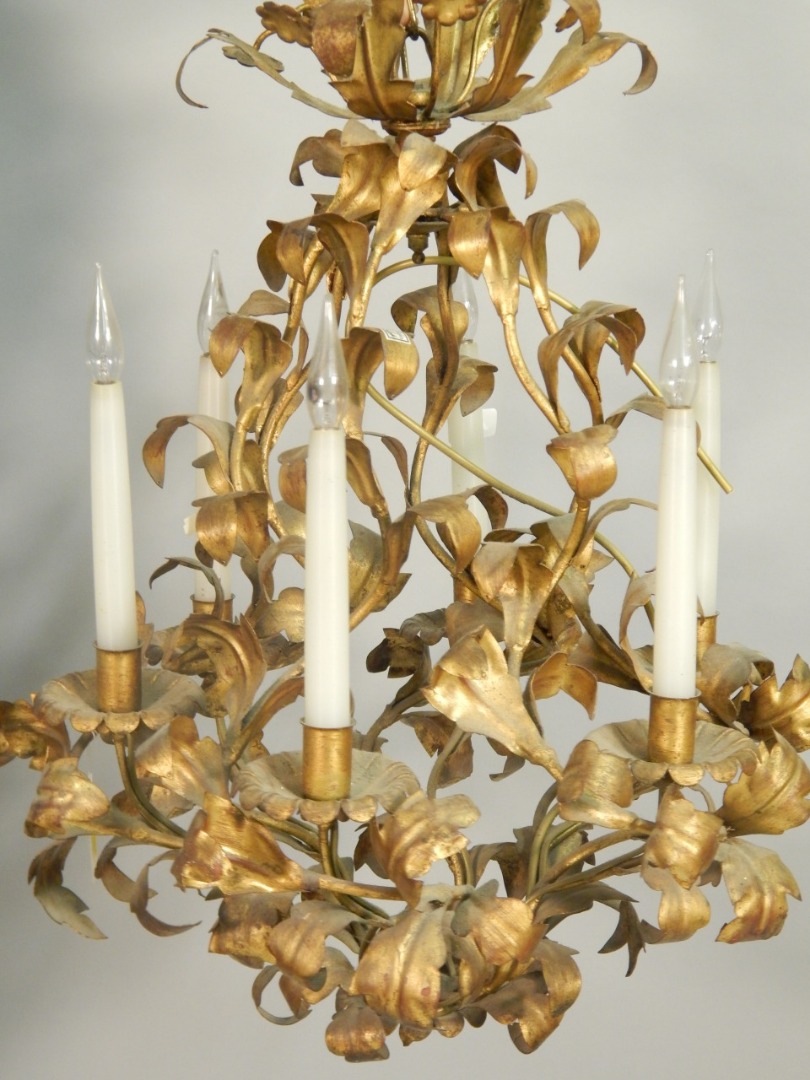 Appraisal: A gilt metal six branch chandelier decorated overall with leaves