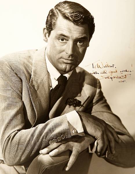 Appraisal: A Cary Grant signed black and white photograph A vintage