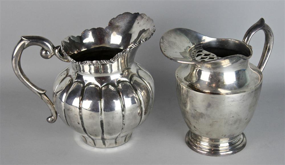 Appraisal: TWO LATIN AMERICAN SILVER PITCHERS one Mexico stamped Heather of