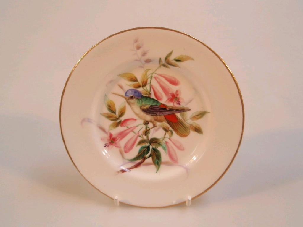 Appraisal: A Royal Worcester plate painted with a humming bird amongst