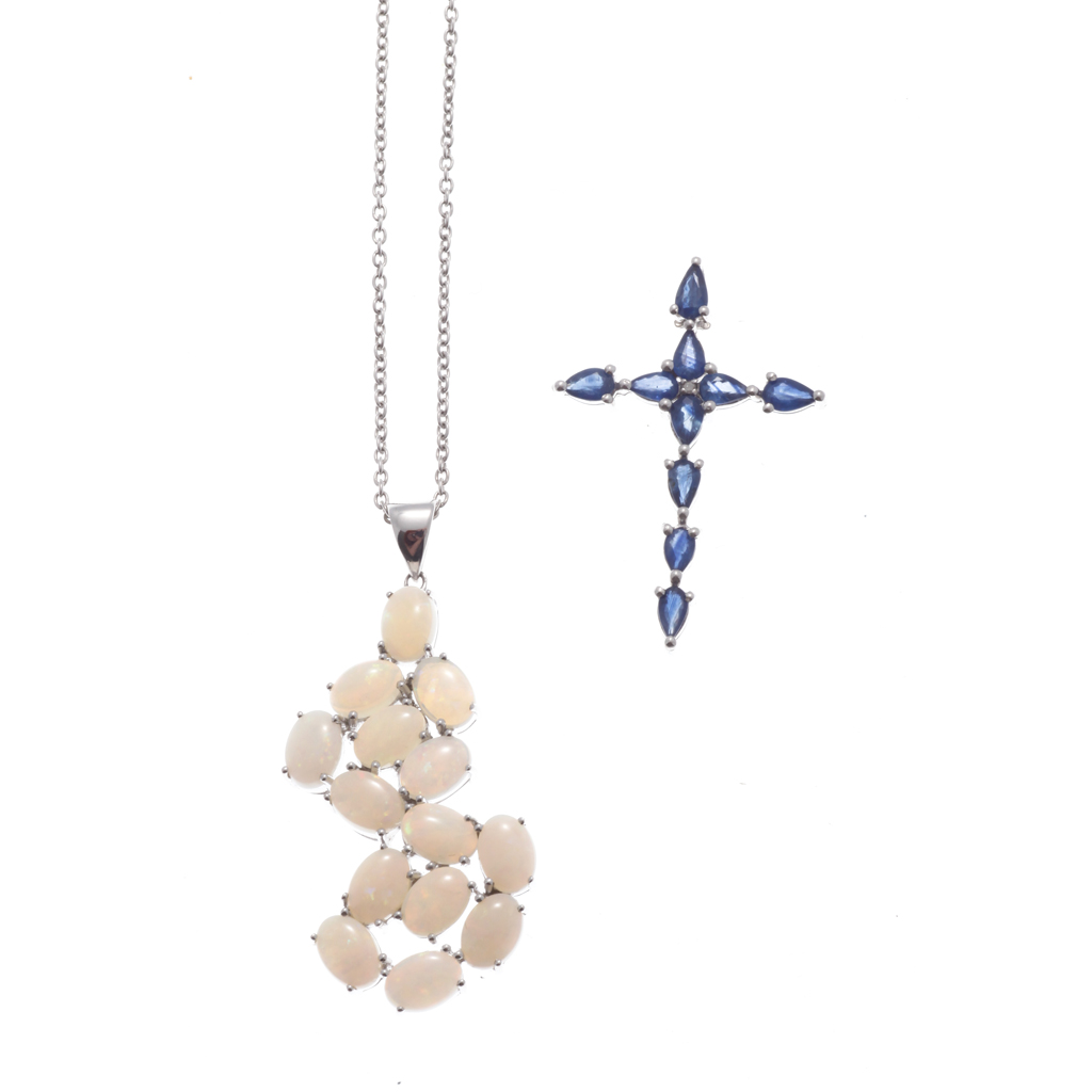 Appraisal: A contemporary opal pendant set throughout in ct white gold