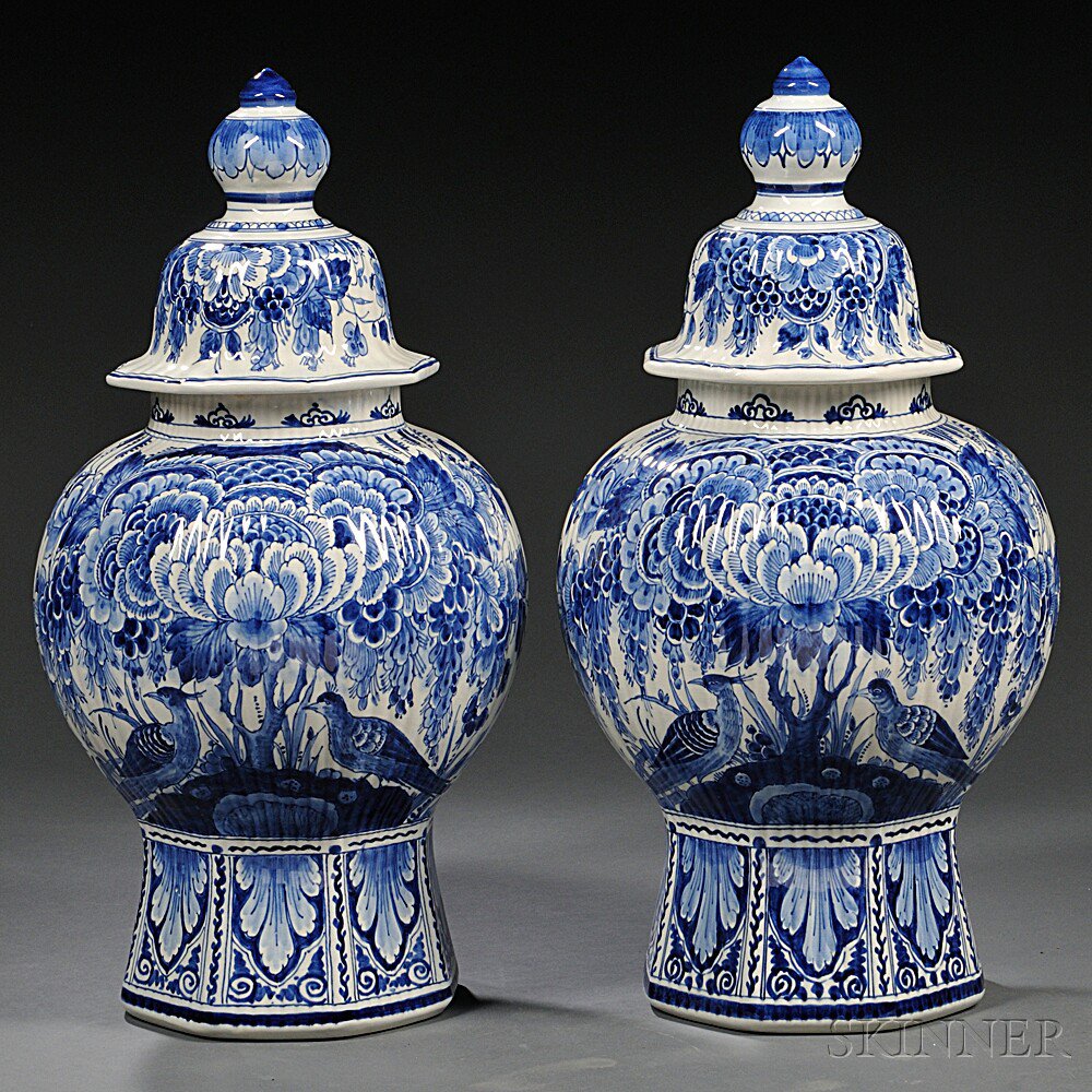 Appraisal: Pair of Delft Blue and White Vases and Covers Holland