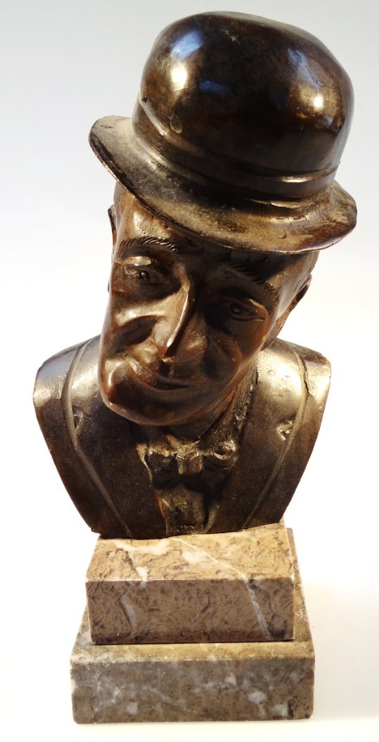 Appraisal: A thC bronze and marble finish bust of a gentleman