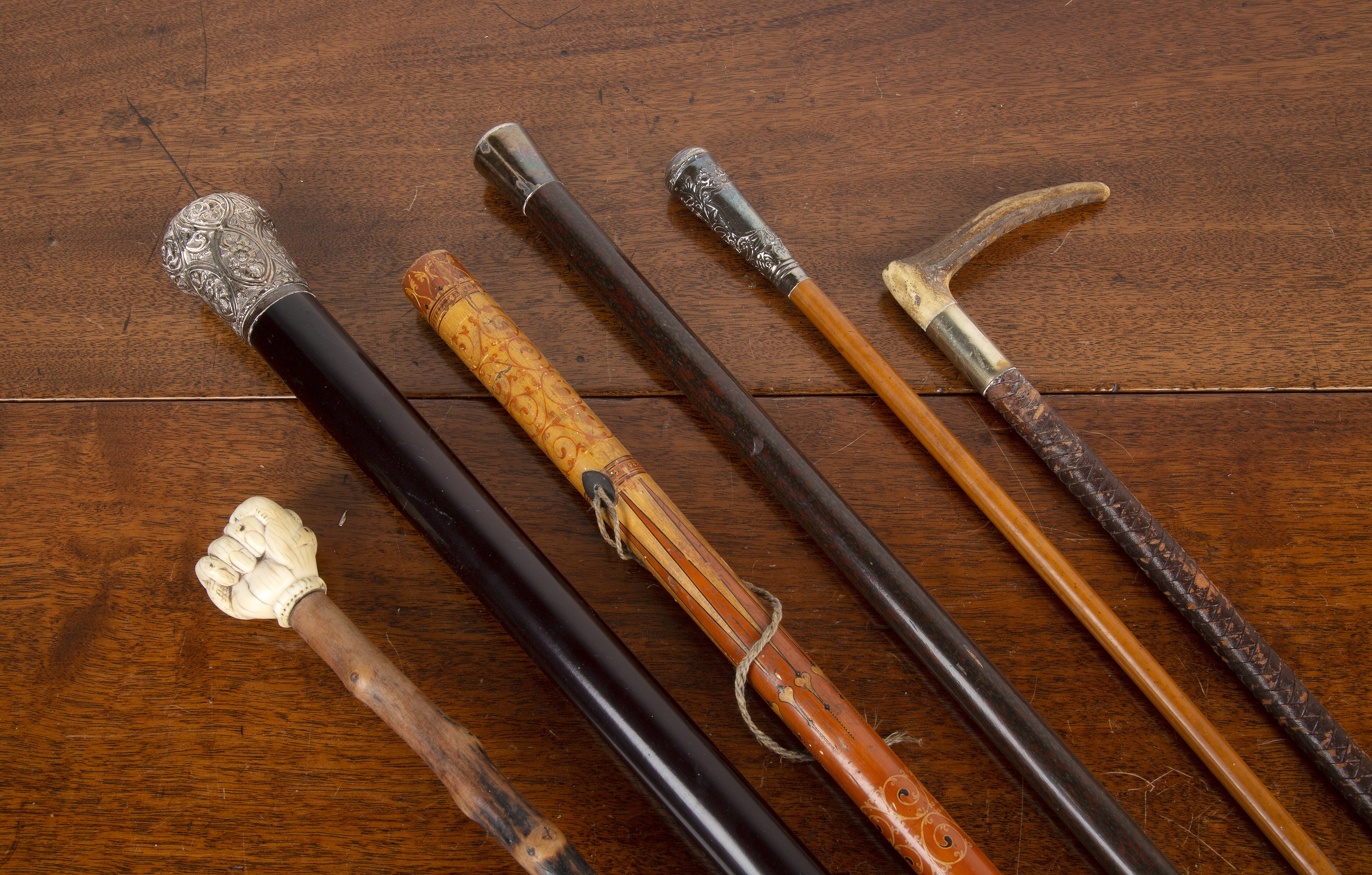 Appraisal: Collection of Victorian and later walking canesand riding crops comprising