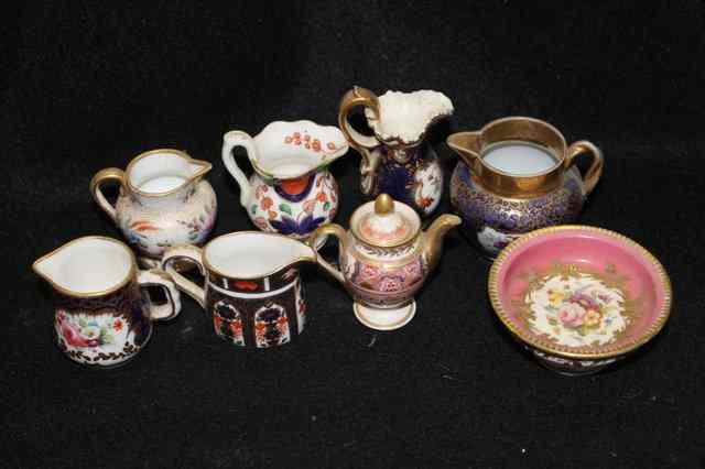 Appraisal: A SMALL COLLECTION OF MINIATURE TH CENTURY CERAMICS including a