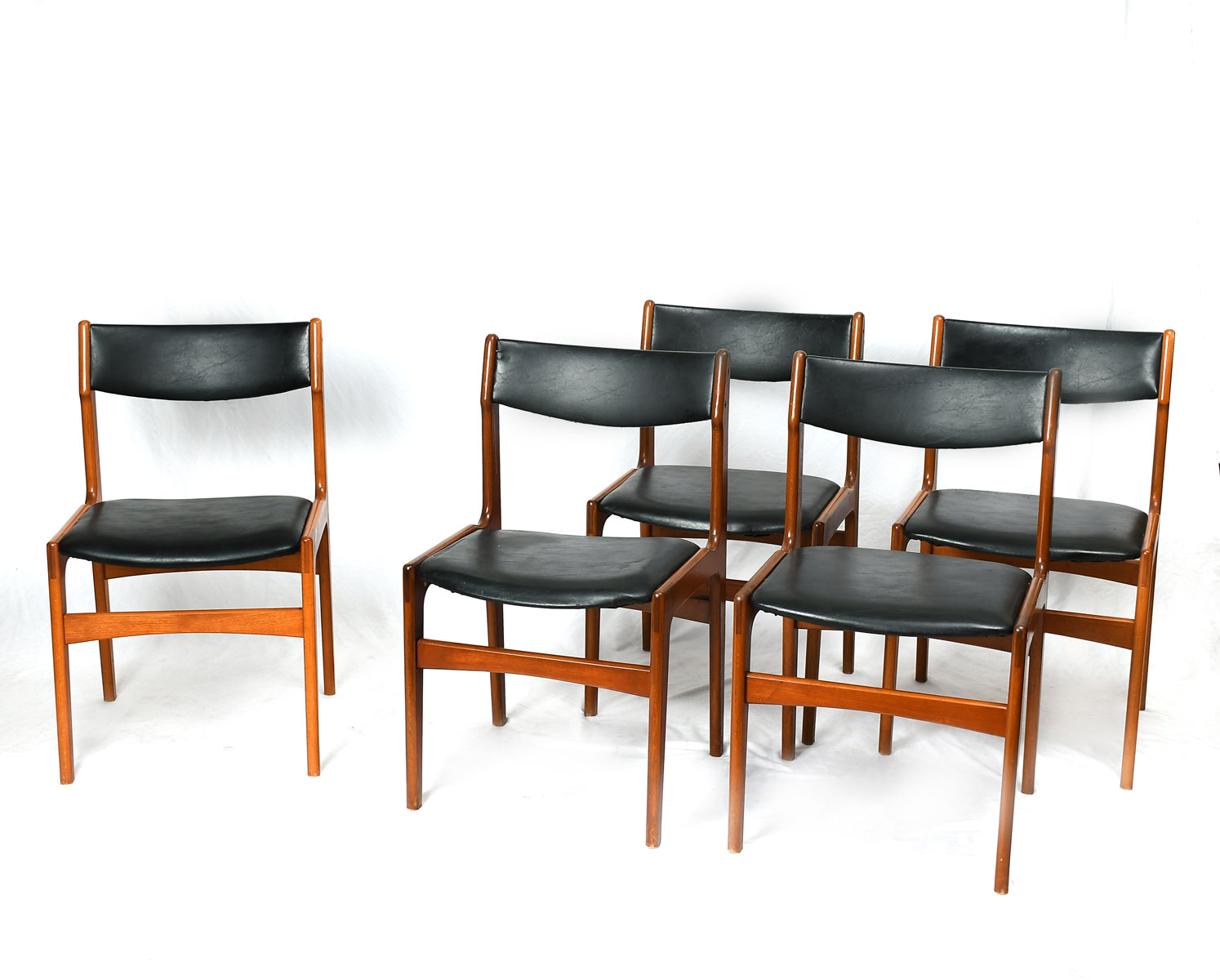 Appraisal: DANISH MID-CENTURY MODERN CHAIRS Of Teak upholstered in black faux