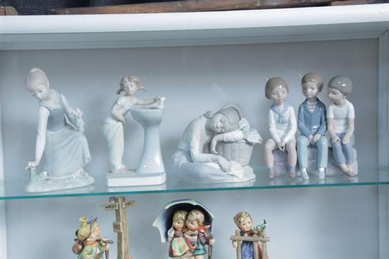 Appraisal: FOUR LLADRO FIGURES Three mat glaze and and one shiny