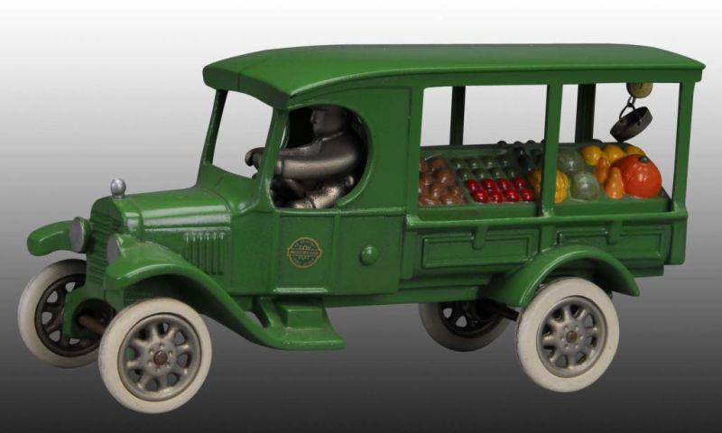 Appraisal: Cast Iron Contemporary Huckster Produce Wagon Toy Description White rubber