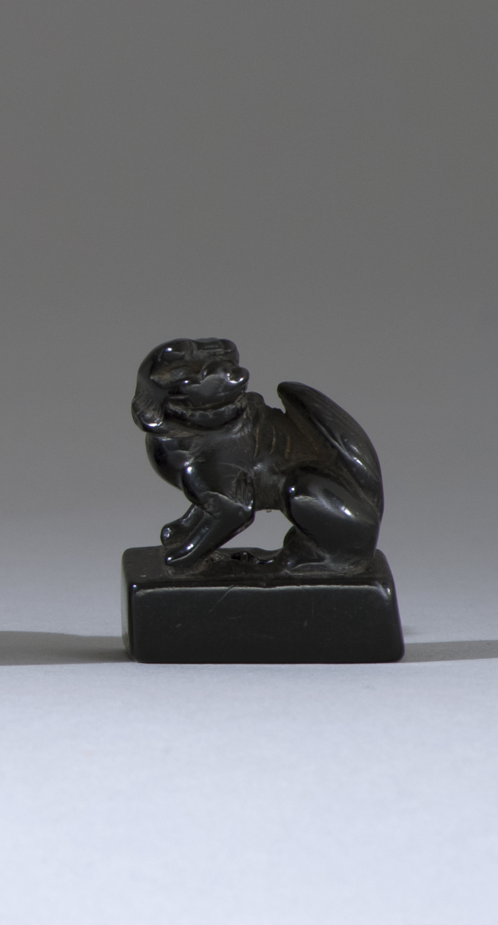 Appraisal: WOOD NETSUKE th CenturyIn the form of a guardian lion