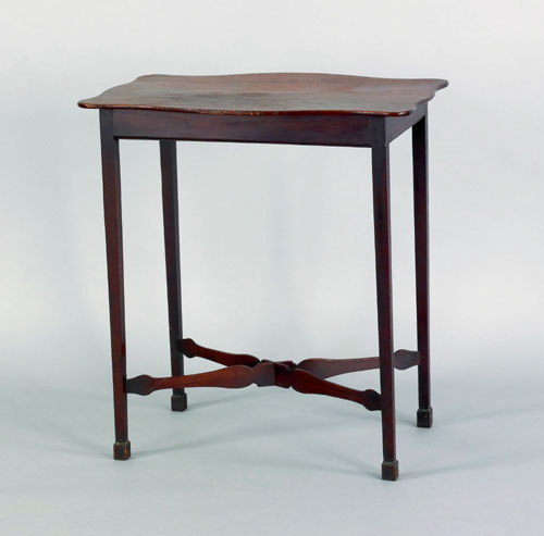 Appraisal: George III mahogany end table ca the serpentine edge top