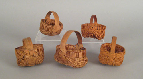 Appraisal: Group of five miniature splint oak baskets th c largest