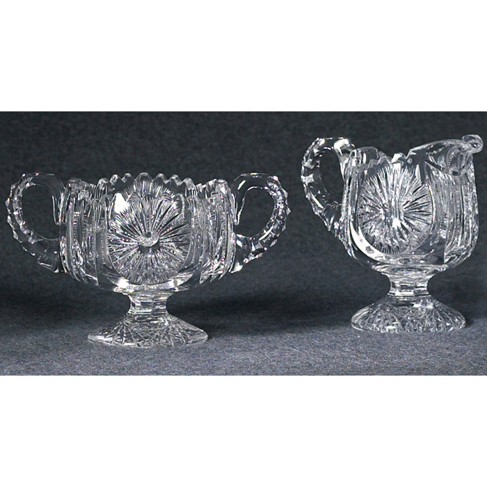 Appraisal: Cut Glass pedestaled creamer and sugar bowl sunburst pattern with